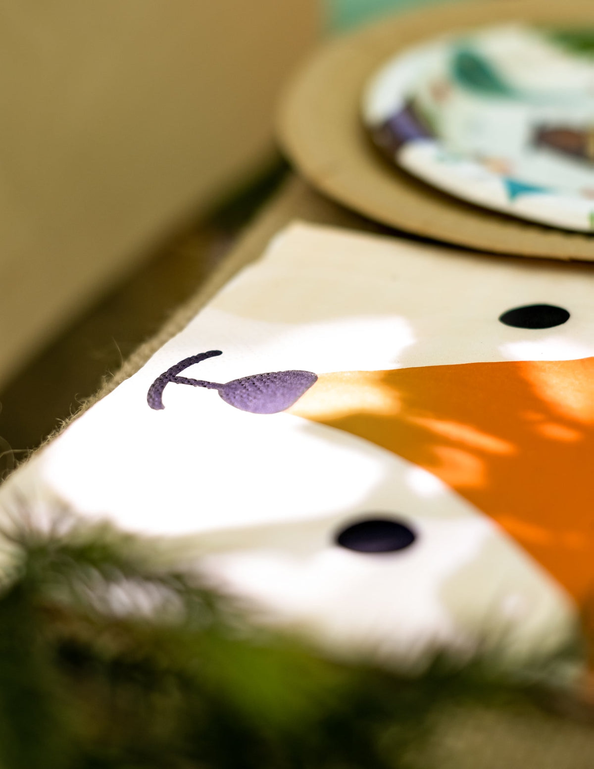 Détail du motif des serviettes en papier tête de renard