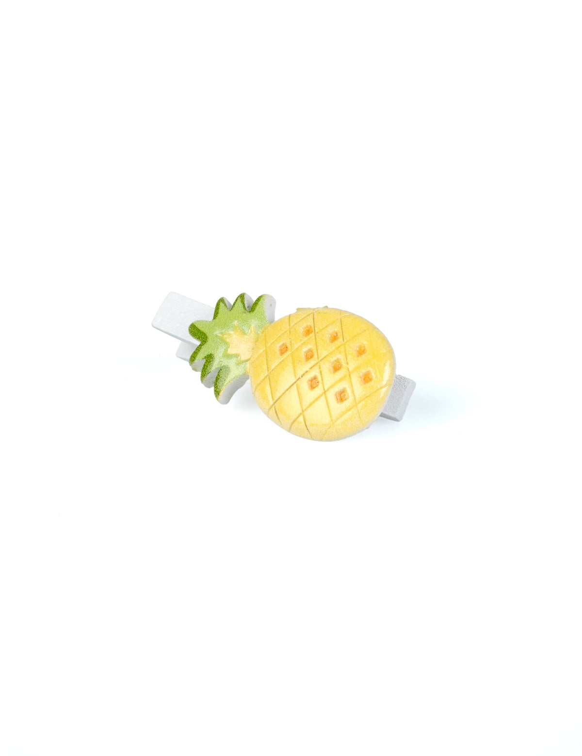 Gros plan sur une pince des pinces décoratives ananas pour table