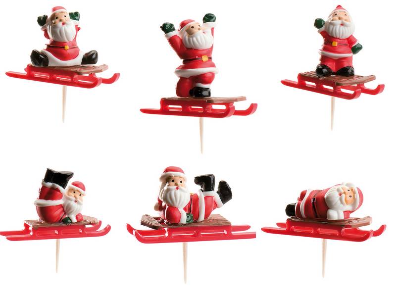 Dekoracija s slikami sani Božička za rdeče in bele hlode