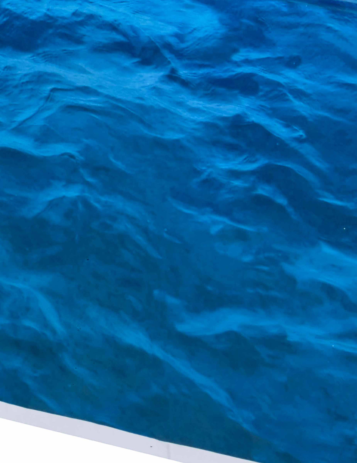 Podrobnosti vzorcev na plastičnem prtu z oceanskimi valovi