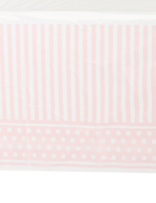 Détail des motifs de la nappe en plastique rayé et à pois pour fête rose et blanc