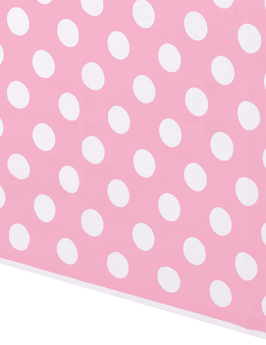 Détail du motif de la nappe décoration rétro rose à pois blancs en plastique