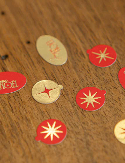 100 confettis Joyeux Noël L'Intemporel rouge et or de 1 à 2 cm