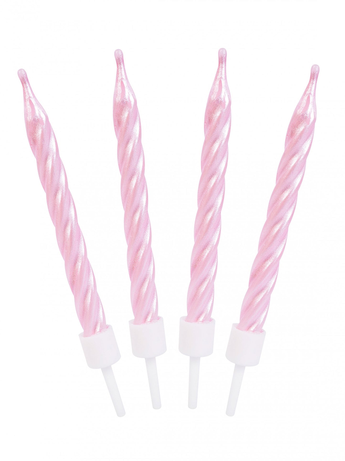 Gros plan des bougies d'anniversaire spirales roses nacrées
