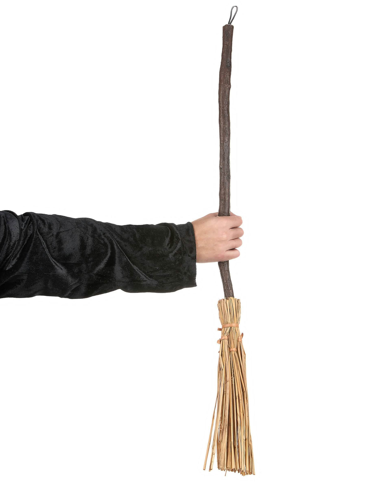 Prikaz metle čarovnice, ki jo drži roka