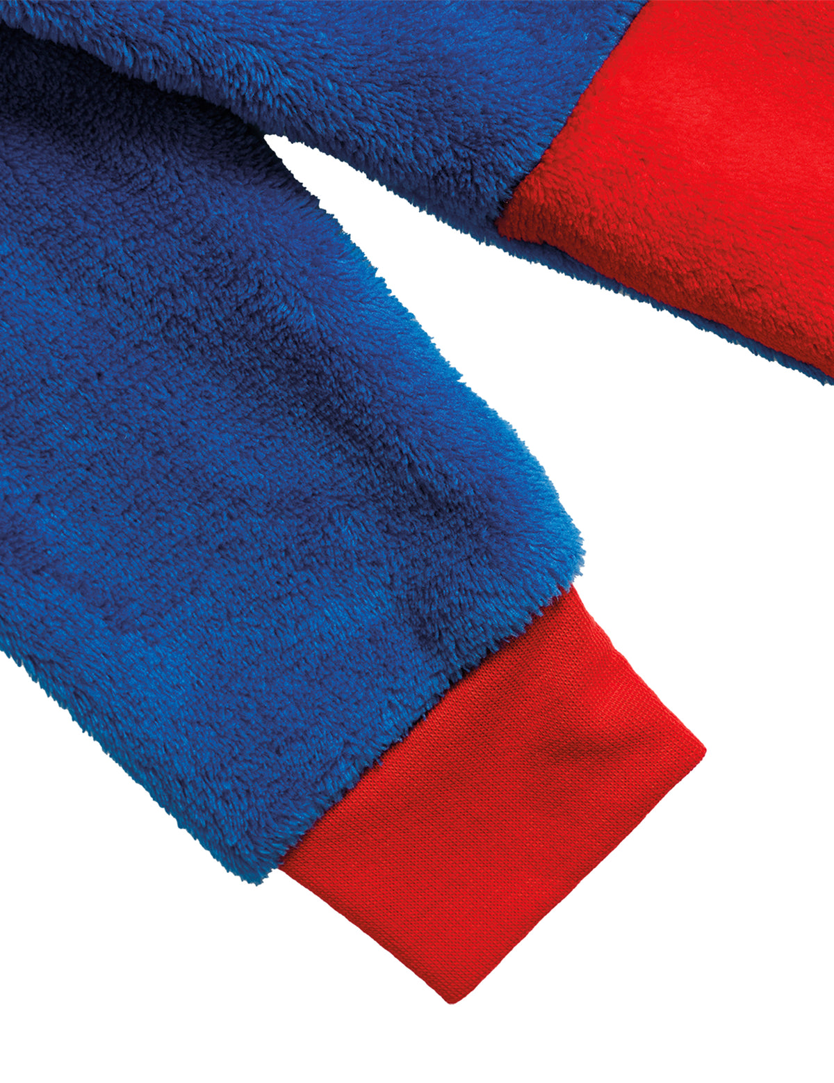 Détail du tissu polaire et du poignet de la combinaison Superman pour enfant