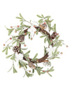 Couronne végétale fleurs de coton et pommes de pin pour décoration verte et blanche givrée