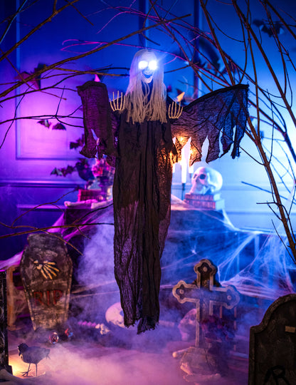 Podrobnost obraza s svetlečimi očmi obešalne dekoracije črni angel smrti