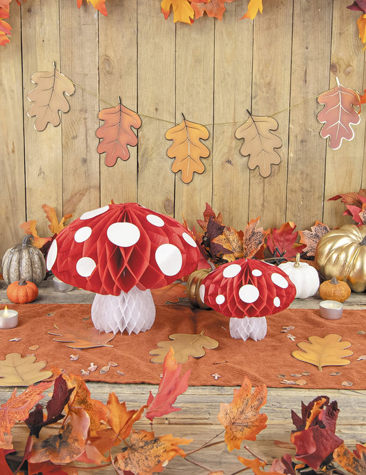 Mise en scène de la décoration champignon alvéolé pour fête rouge et blanc