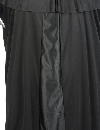 Détail du tissu et des plis du déguisement de faucheuse