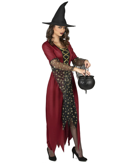 Vue de profil du déguisement de sorcière pour femme tenant un chaudron noir