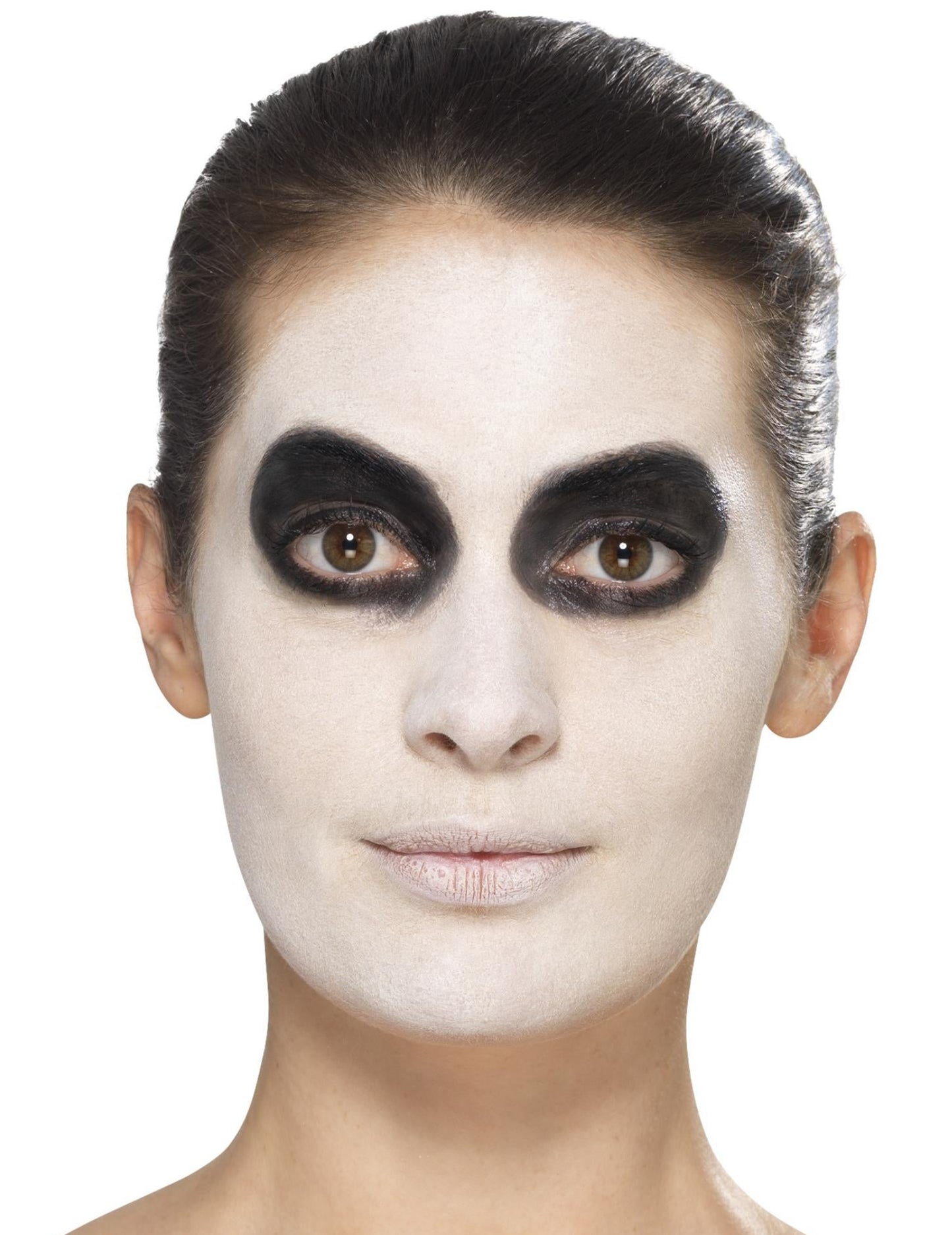Gros plan sur le maquillage de base du kit maquillage glamour avec faux cils et bijoux Dia de los muertos