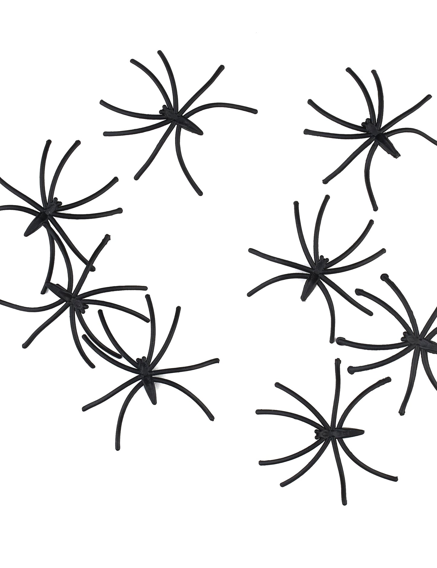 Vue rapprochée des mini araignées décoratives noires en plastique