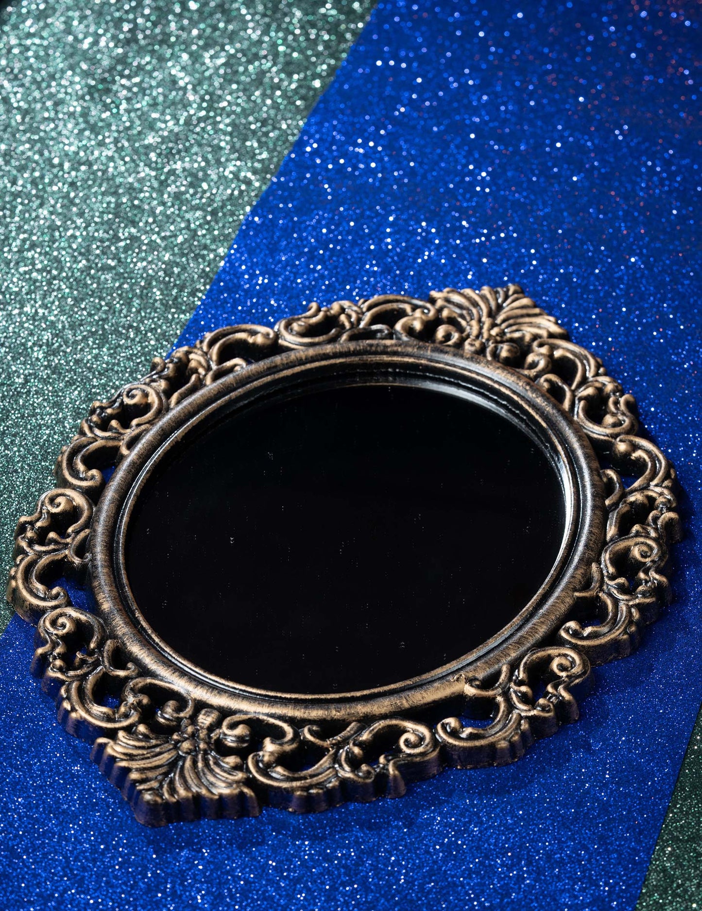 Črno in starinsko bronasto ogledalo, 40 cm