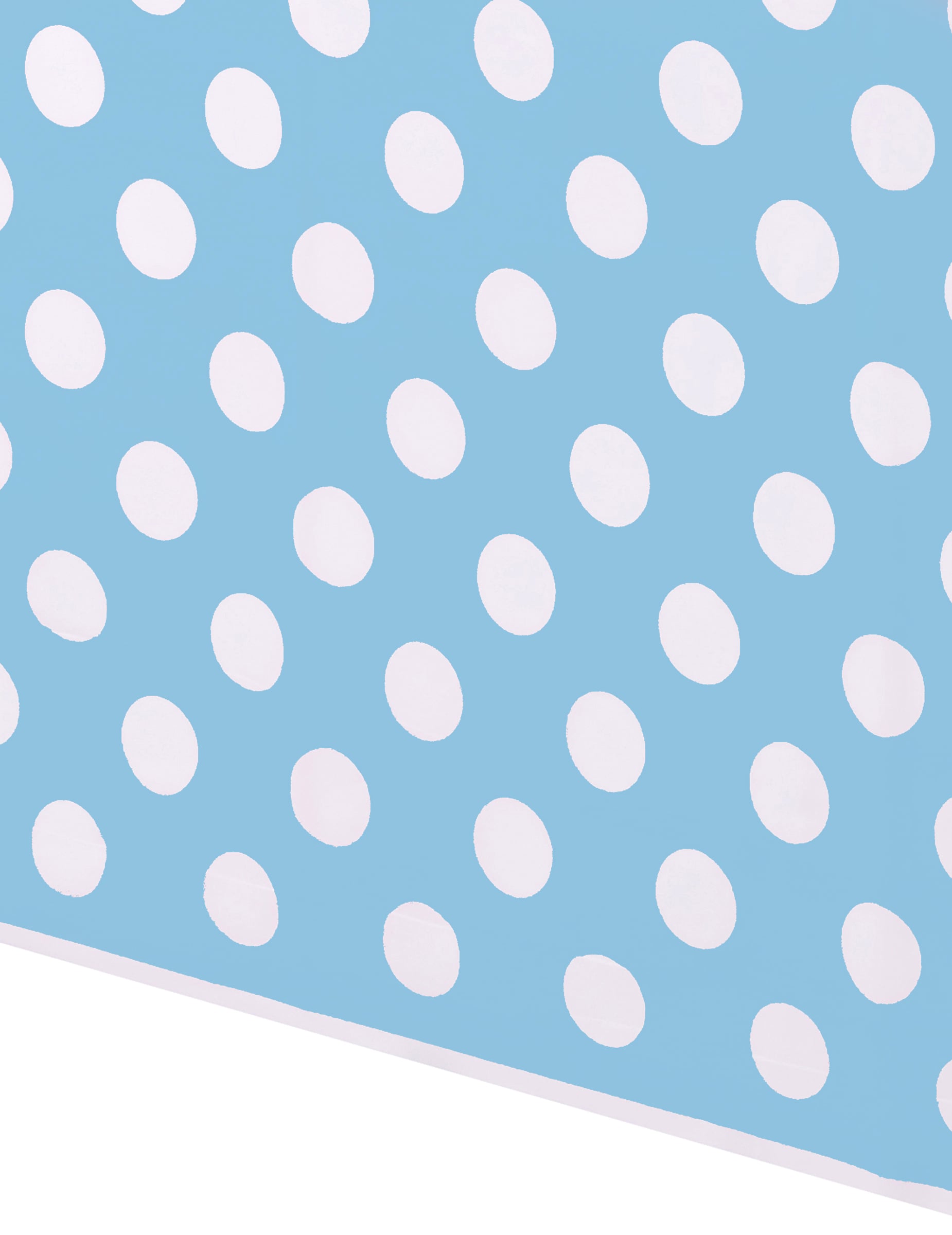 Gros plan sur le motif à pois de la nappe à pois pour fête bleue et blanche en plastique