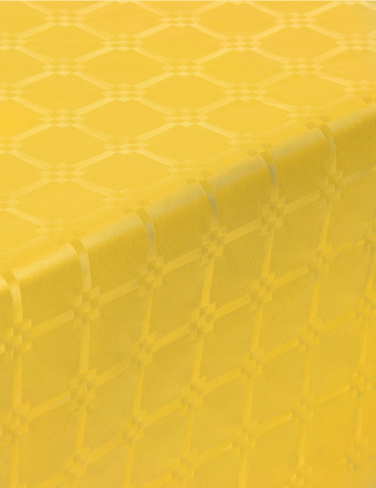 Gros plan sur le motif de la nappe en rouleau papier damassé jaune