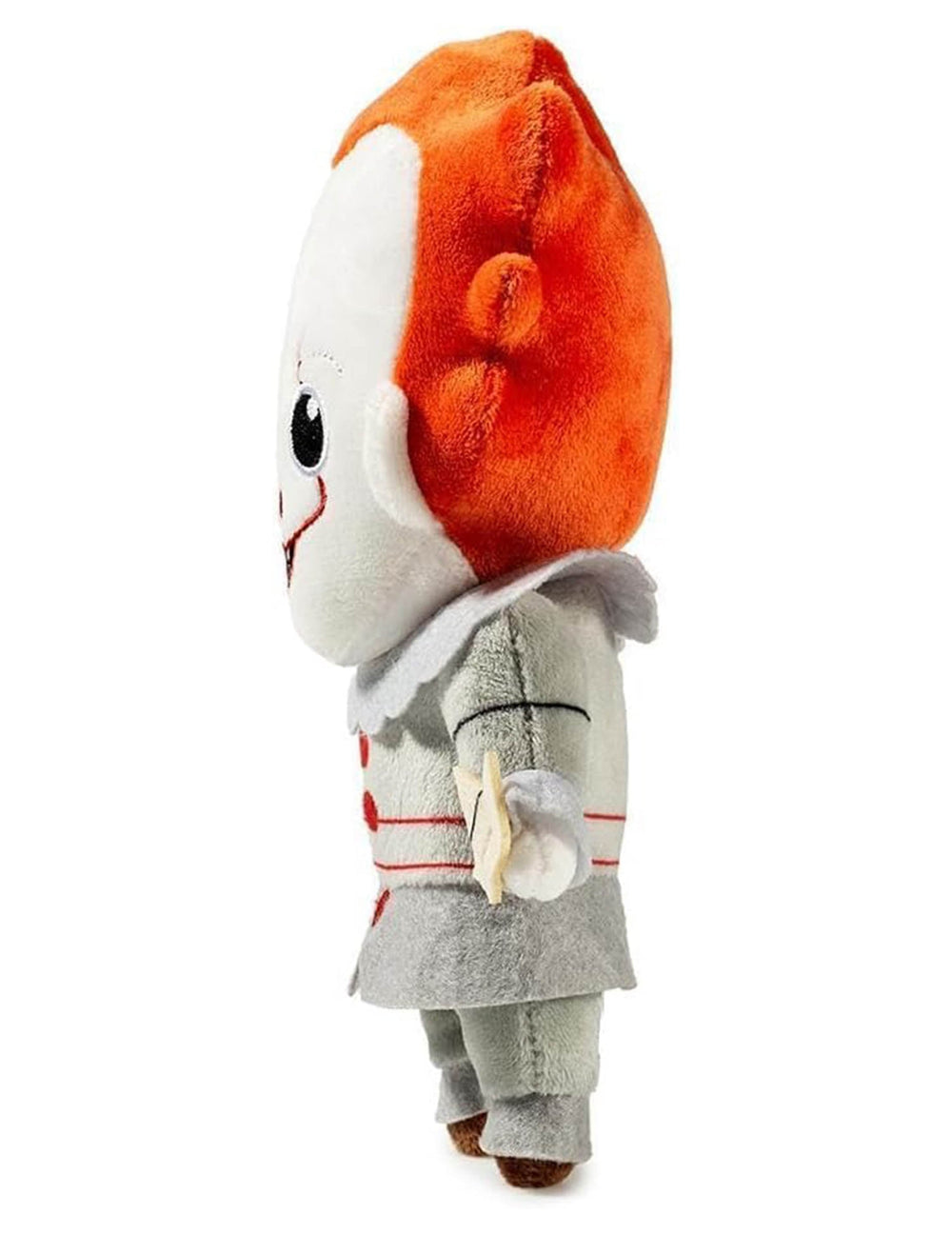 Vue de profil de la peluche Ça