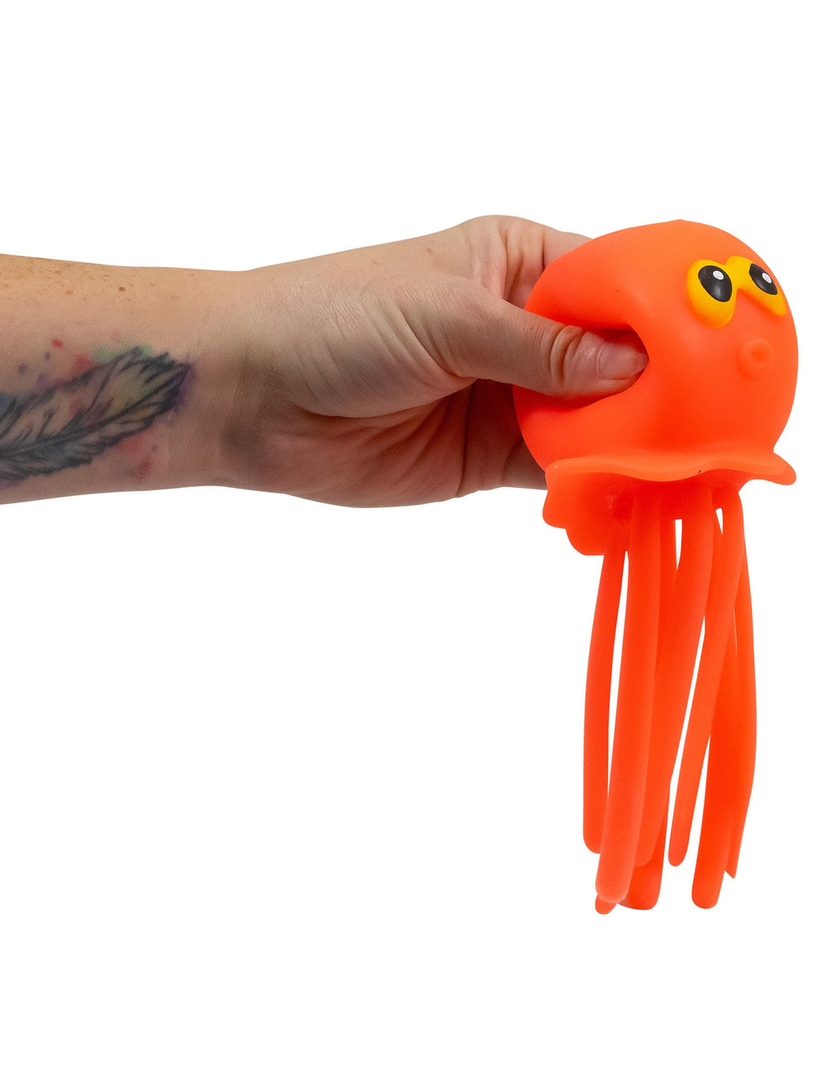 Pression exercée sur le modèle orange du jouet pieuvre splash à effet jet d’eau