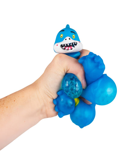 Deformabilna igrača v obliki pošastne žoge